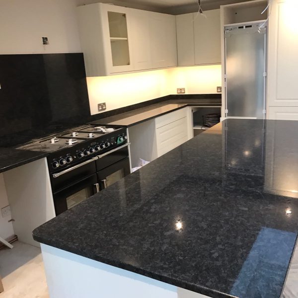 Grey Granite worktops and island piece. One of our favourite Granite ...