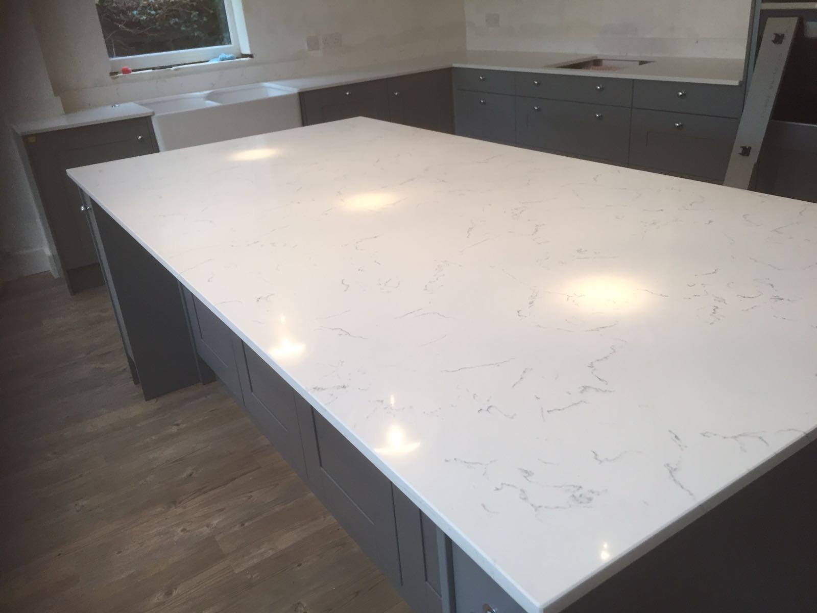 Carrara White Quartz - Rock & Co Granite and Quartz Worktops