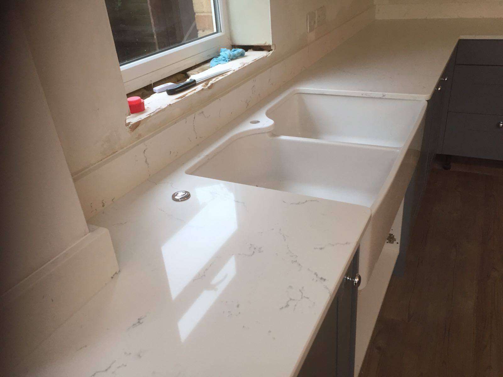 Carrara White Quartz - Rock & Co Granite and Quartz Worktops