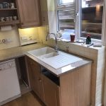 caffe magnifico urban quartz worktops installed with brown traditional kitchen