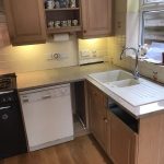 caffe magnifico urban quartz worktops installed with brown traditional kitchen