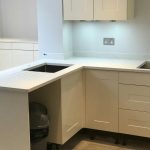 carrera quartz with white traditional shaker kitchen