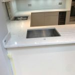 carrera quartz with white traditional shaker kitchen