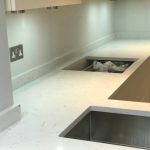 carrera quartz with white traditional shaker kitchen