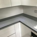 grigio scuro stella, dark grey starlight quartz worktops with white high gloss kitchen