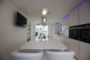 kitchen island with white quartz tops