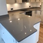 magnifico de lusso grey quartz worktops with high gloss white kitchen