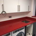 red starlight rosso stella urban quartz with grey glossy kitchen