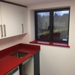 red starlight rosso stella urban quartz with grey glossy kitchen