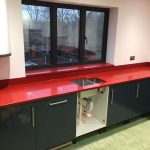 red starlight rosso stella urban quartz with grey glossy kitchen