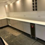 bianco nevoso white quartz installed in grey gloss kitchen dane end ware