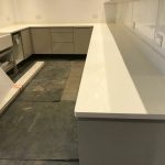 bianco nevoso white quartz installed in grey gloss kitchen dane end ware