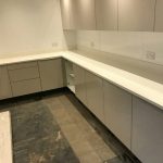 bianco nevoso white quartz installed in grey gloss kitchen dane end ware