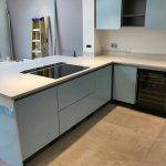 bianco de lusso quartz worktops in white gloss kitchen