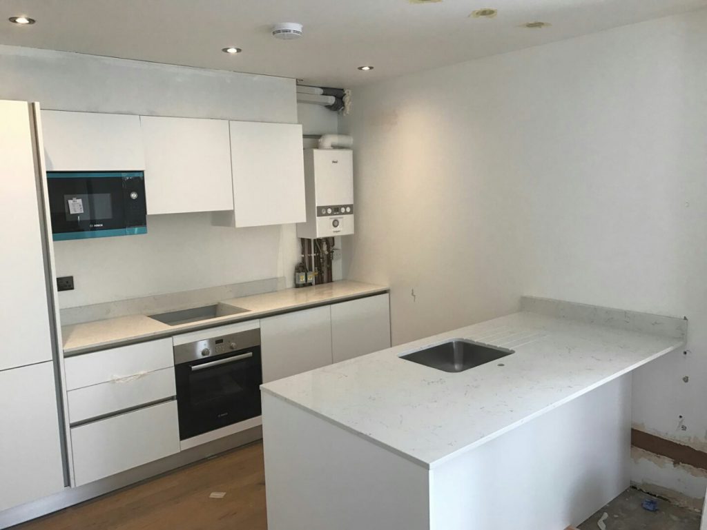 carrera quartz worktops in white kitchen wandsworth london by rockandco