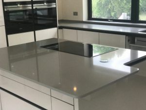 grigio chiaro pura quartz worktops in grey high gloss kitchen