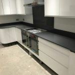 grigio scuro pura dark grey quartz worktops in white gloss kitchen