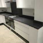 grigio scuro pura dark grey quartz worktops in white gloss kitchen