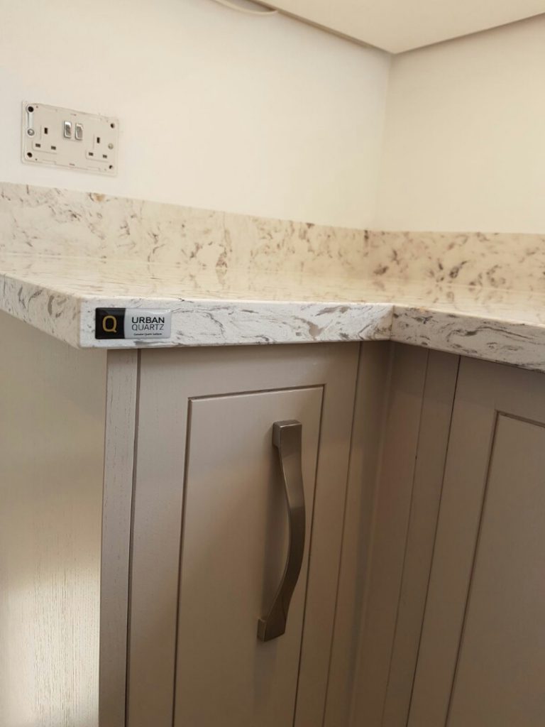 strapazzate urban quartz worktops in traditional cream kitchen