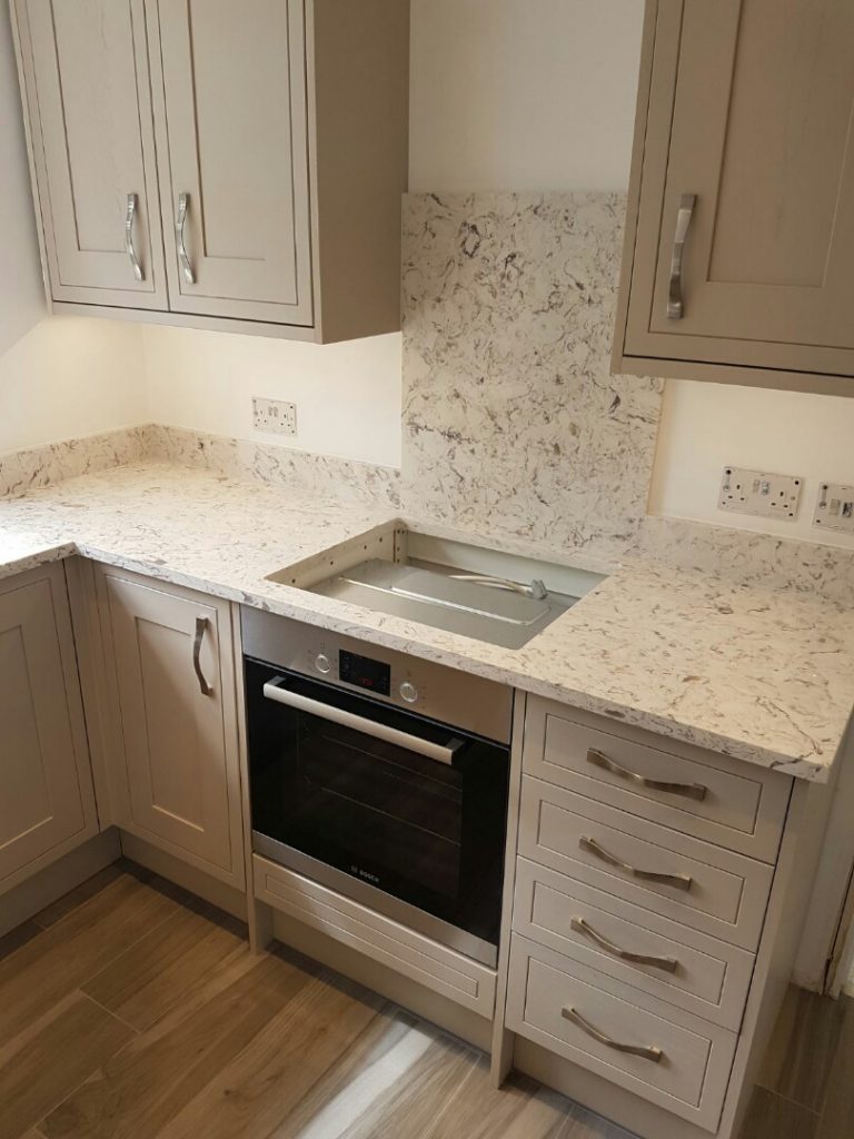 strapazzate urban quartz worktops in traditional cream kitchen