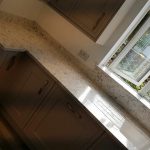 strapazzate urban quartz worktops in traditional cream kitchen