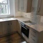 strapazzate urban quartz worktops in traditional cream kitchen