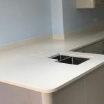 bianco de lusso white quartz worktops in grey kitchen