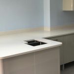 bianco de lusso white quartz worktops in grey kitchen