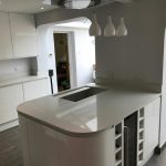 bianco de lusso quartz worktops in gloss white kitchen