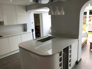 bianco de lusso quartz worktops in gloss white kitchen