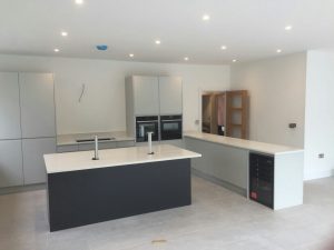 bianco minerale quartz worktops installed in large open plan kitchen