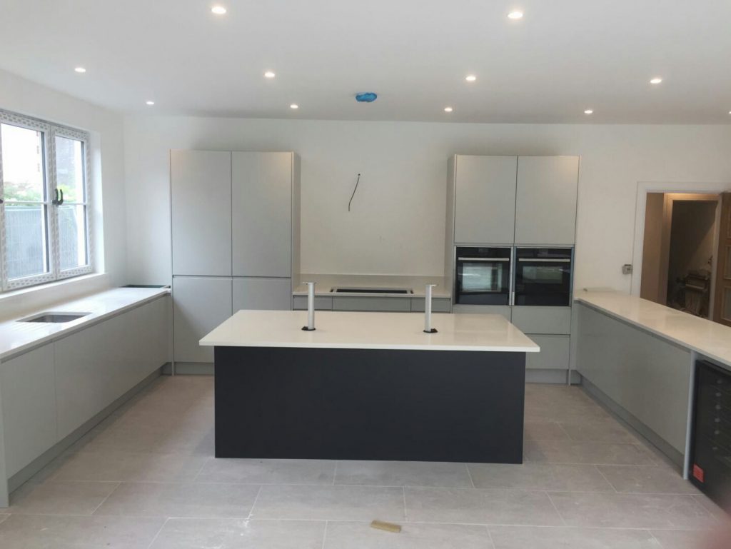 bianco minerale quartz worktops installed in large open plan kitchen