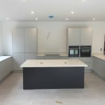 bianco minerale quartz worktops installed in large open plan kitchen