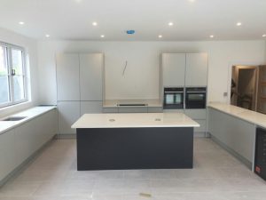 bianco minerale quartz worktops installed in large open plan kitchen