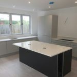 bianco minerale quartz worktops installed in large open plan kitchen