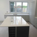 bianco minerale quartz worktops installed in large open plan kitchen