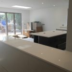 bianco minerale quartz worktops installed in large open plan kitchen