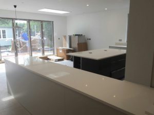 bianco minerale quartz worktops installed in large open plan kitchen