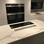 calacutta urban quartz in high gloss kitchen rockandco