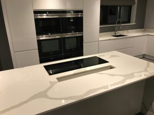 calacutta urban quartz in high gloss kitchen rockandco