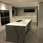 calacutta urban quartz in high gloss kitchen rockandco