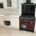 carrera quartz worktops in white high gloss kitchen