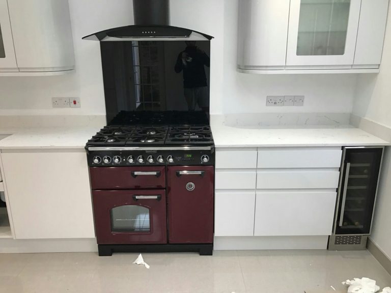 carrera quartz worktops in white high gloss kitchen