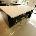 bianco puro pure white quartz worktops in blue traditional kitchen