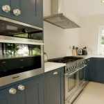 bianco puro pure white quartz worktops in blue traditional kitchen