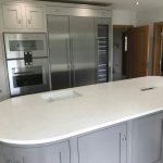 attica white carrera white quartz in kitchen with island