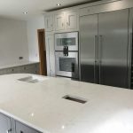 attica white carrera white quartz in kitchen with island