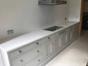 attica white carrera white quartz in kitchen with island