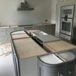 attica white carrera white quartz in kitchen with island