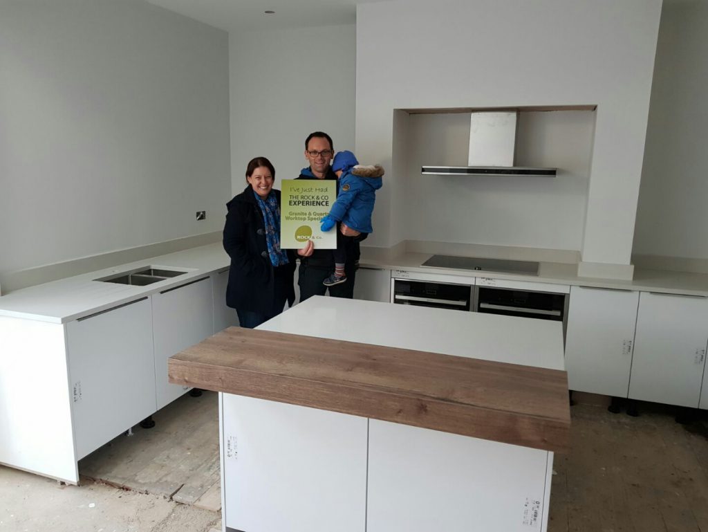 bianco de lusso quartz worktops with wooden breakfast bar